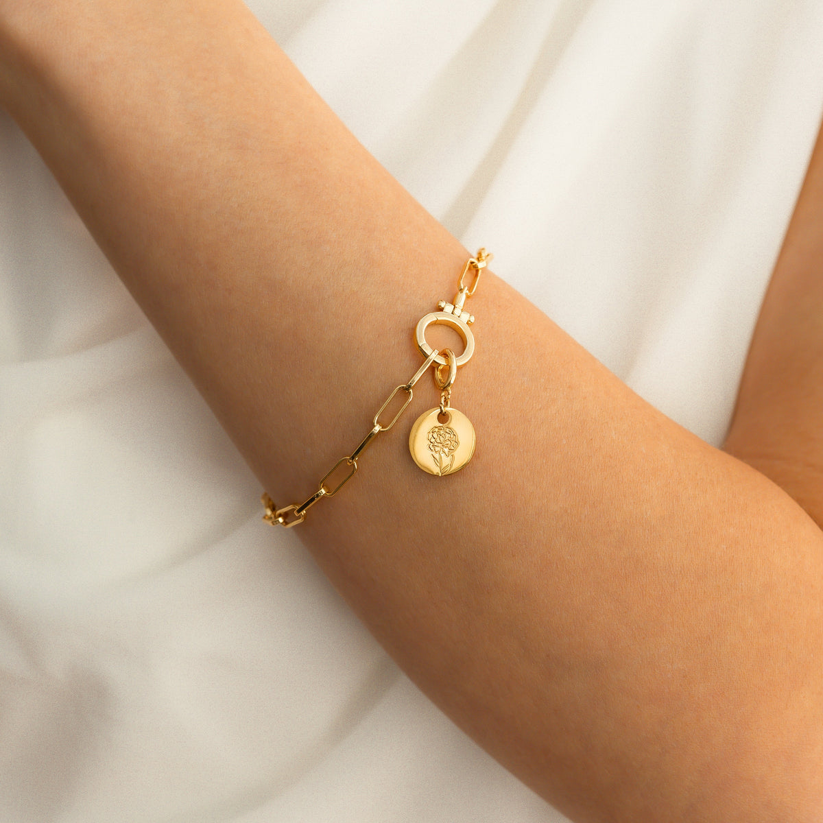 Charm de disco grabado con flor de nacimiento