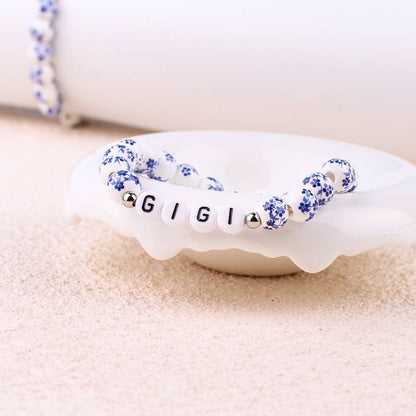 Pulsera personalizada de cuentas de porcelana azul con nombre