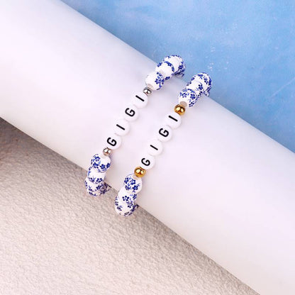 Pulsera personalizada de cuentas de porcelana azul con nombre
