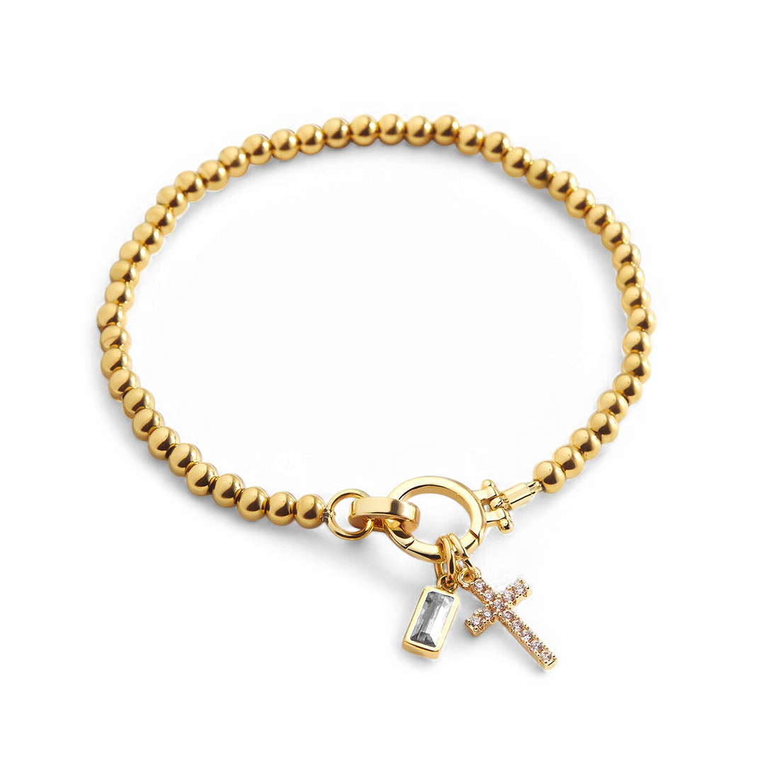 Pulsera con charm de cruz y piedra de nacimiento