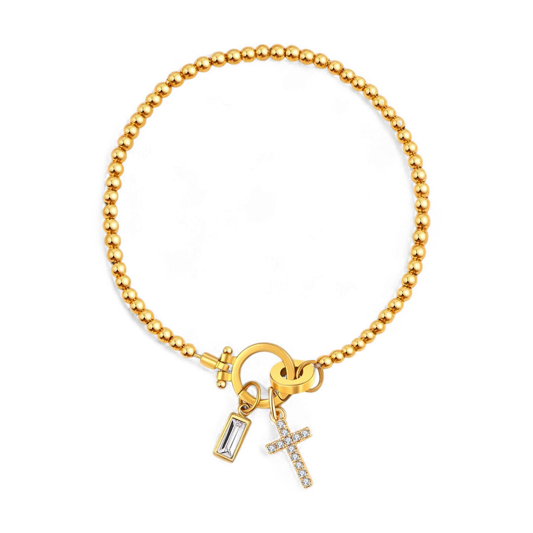 Pulsera con charm de cruz y piedra de nacimiento