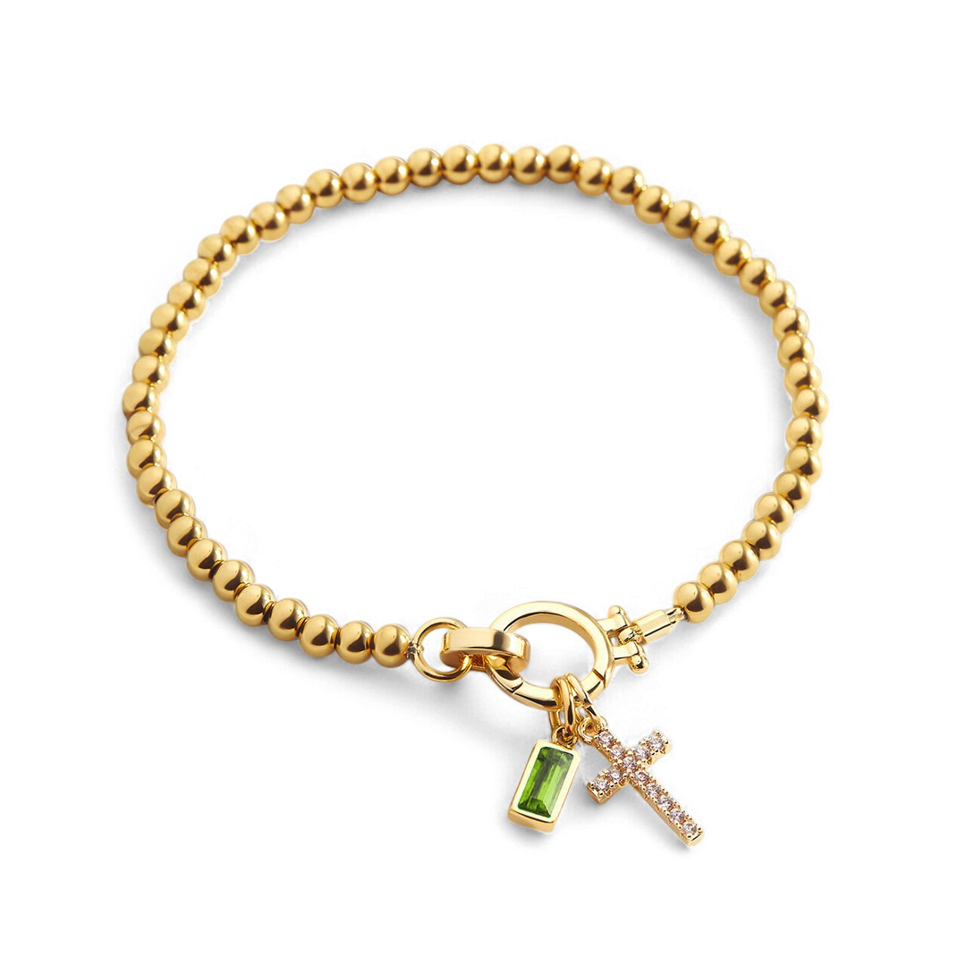 Pulsera con charm de cruz y piedra de nacimiento