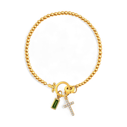 Pulsera con charm de cruz y piedra de nacimiento