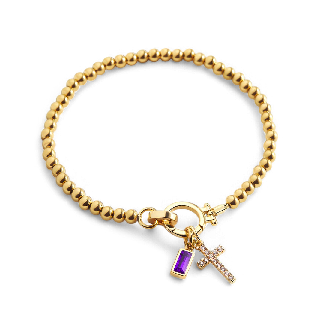 Pulsera con charm de cruz y piedra de nacimiento