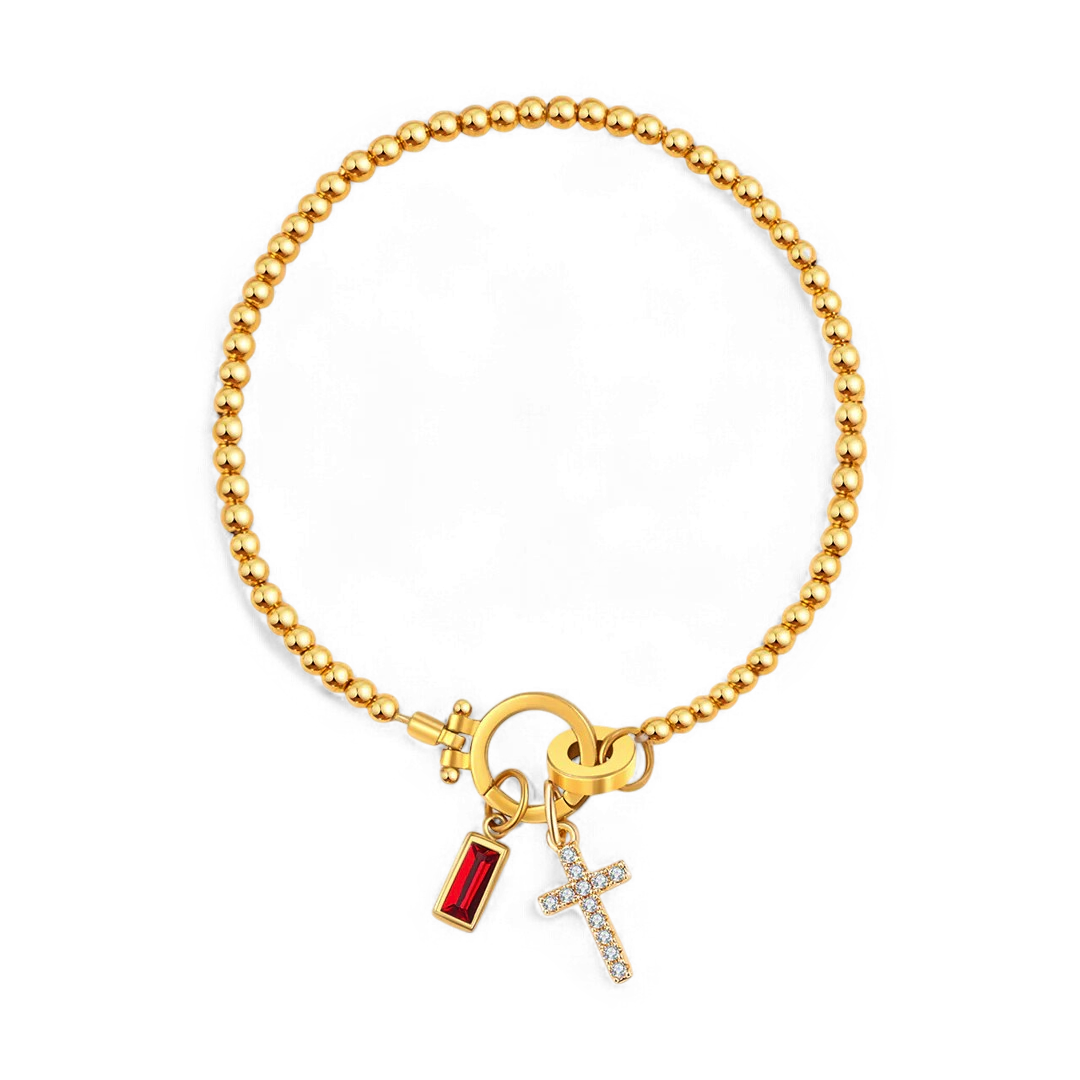 Pulsera con charm de cruz y piedra de nacimiento