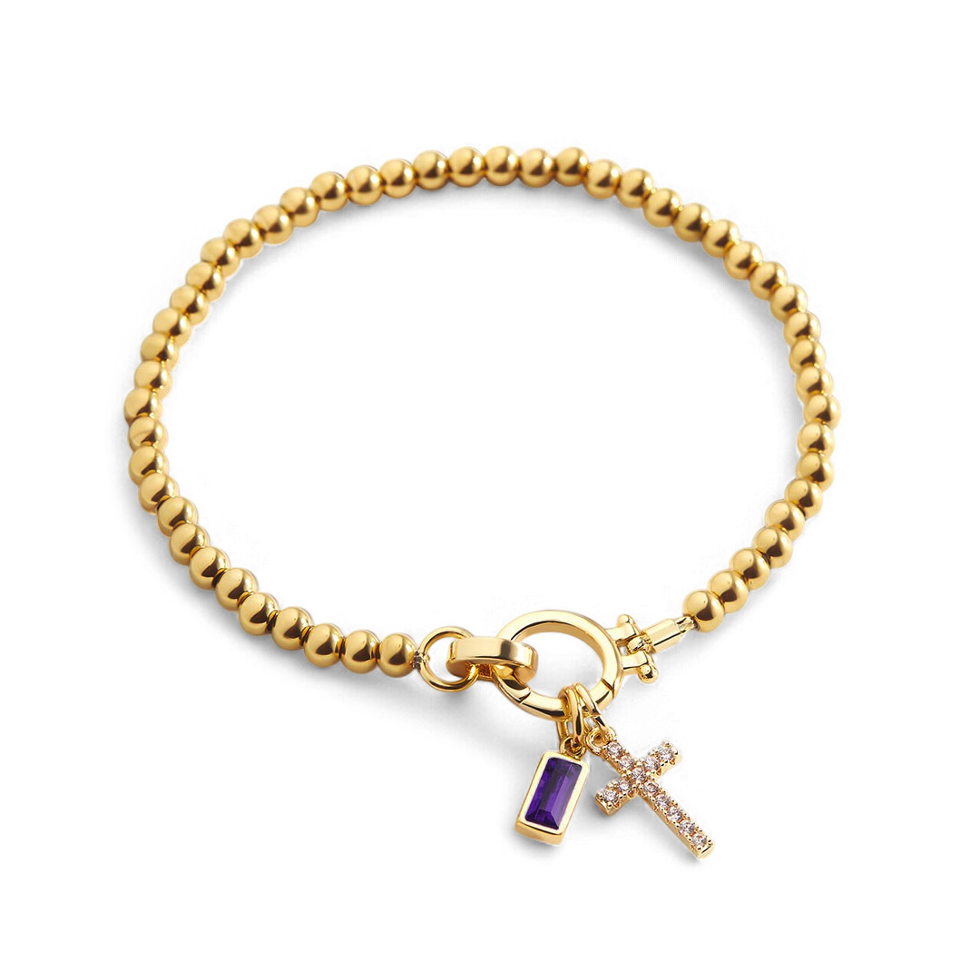 Pulsera con charm de cruz y piedra de nacimiento