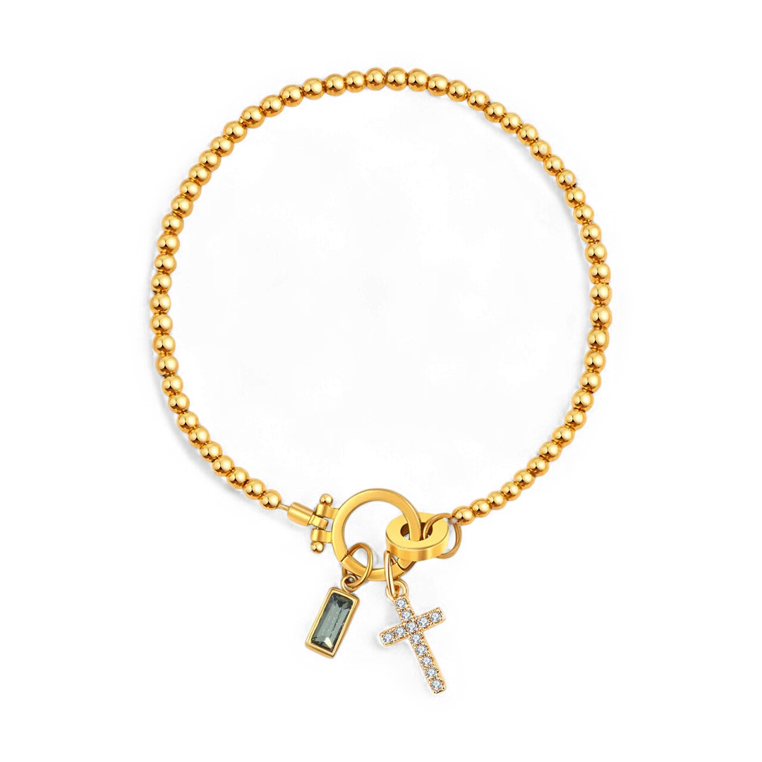 Pulsera con charm de cruz y piedra de nacimiento