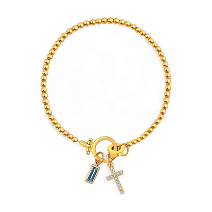 Pulsera con charm de cruz y piedra de nacimiento