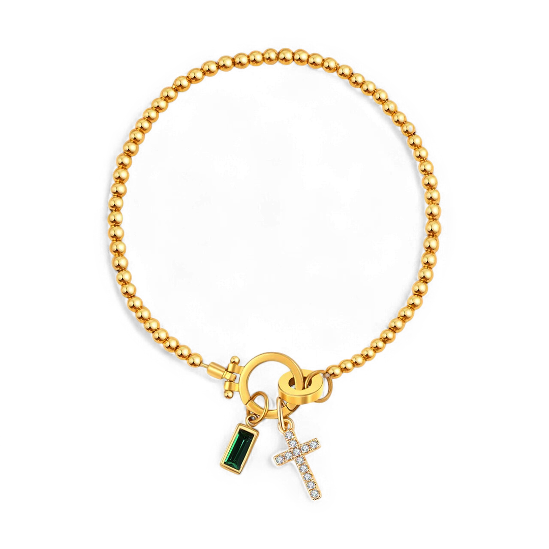 Pulsera con charm de cruz y piedra de nacimiento