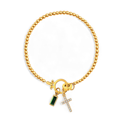 Pulsera con charm de cruz y piedra de nacimiento