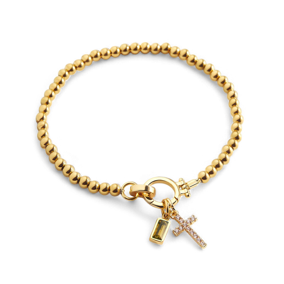 Pulsera con charm de cruz y piedra de nacimiento