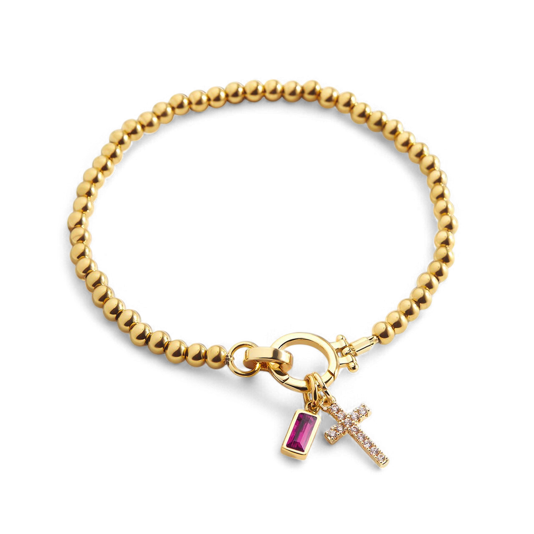 Pulsera con charm de cruz y piedra de nacimiento