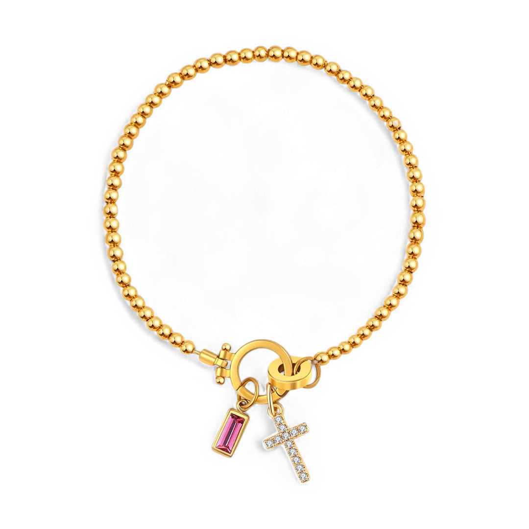 Pulsera con charm de cruz y piedra de nacimiento