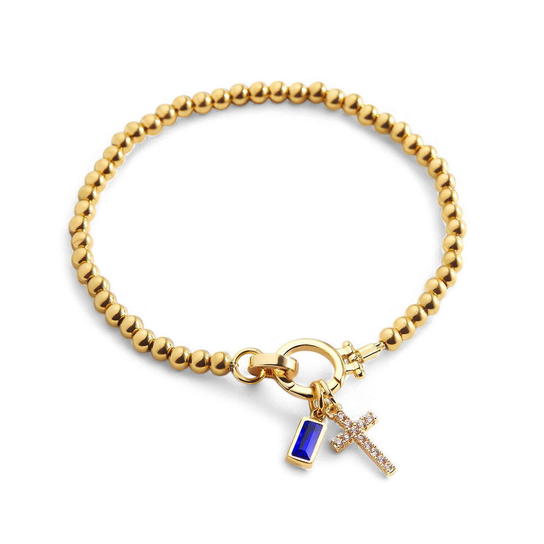 Pulsera con charm de cruz y piedra de nacimiento