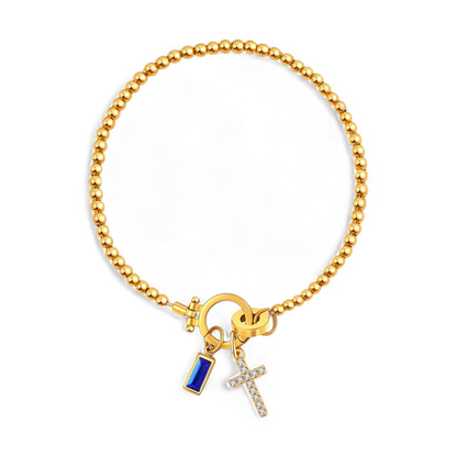 Pulsera con charm de cruz y piedra de nacimiento