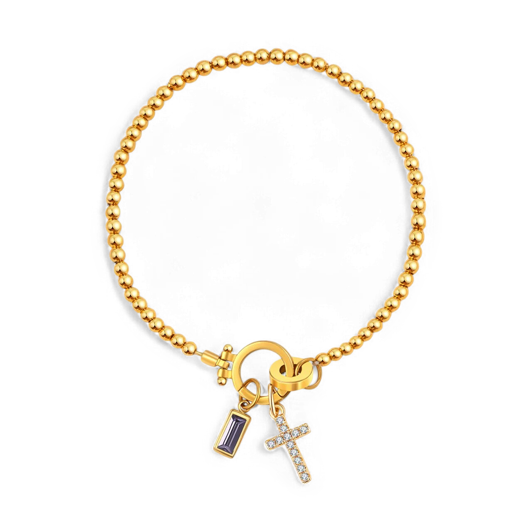 Pulsera con charm de cruz y piedra de nacimiento