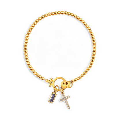 Pulsera con charm de cruz y piedra de nacimiento
