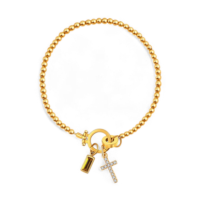 Pulsera con charm de cruz y piedra de nacimiento