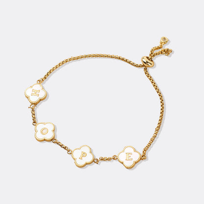Bracelet personnalisé avec nom et trèfle à quatre feuilles