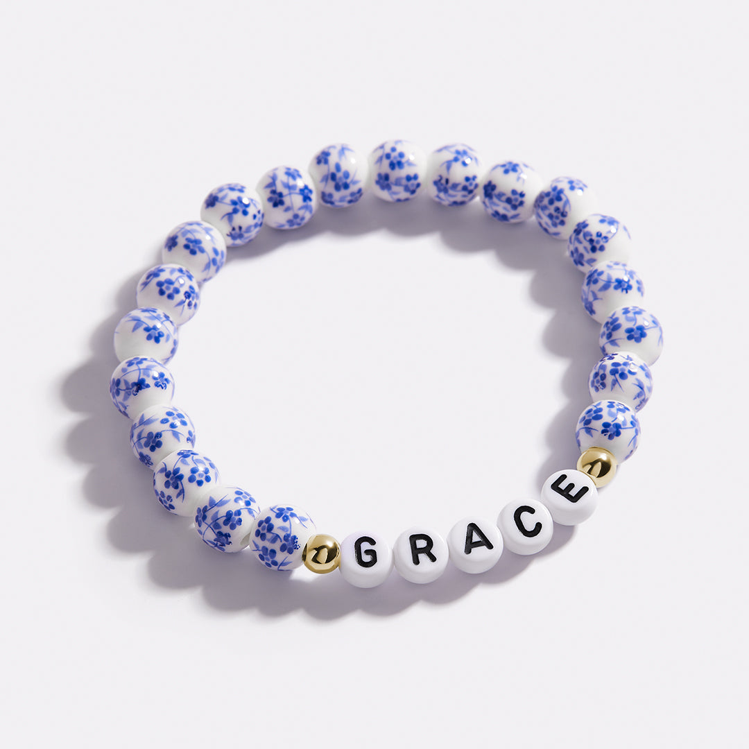 Pulsera personalizada de cuentas de porcelana azul con nombre