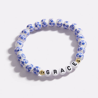Pulsera personalizada de cuentas de porcelana azul con nombre