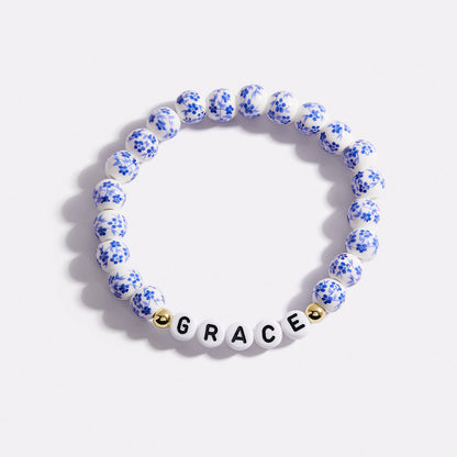 Pulsera personalizada de cuentas de porcelana azul con nombre