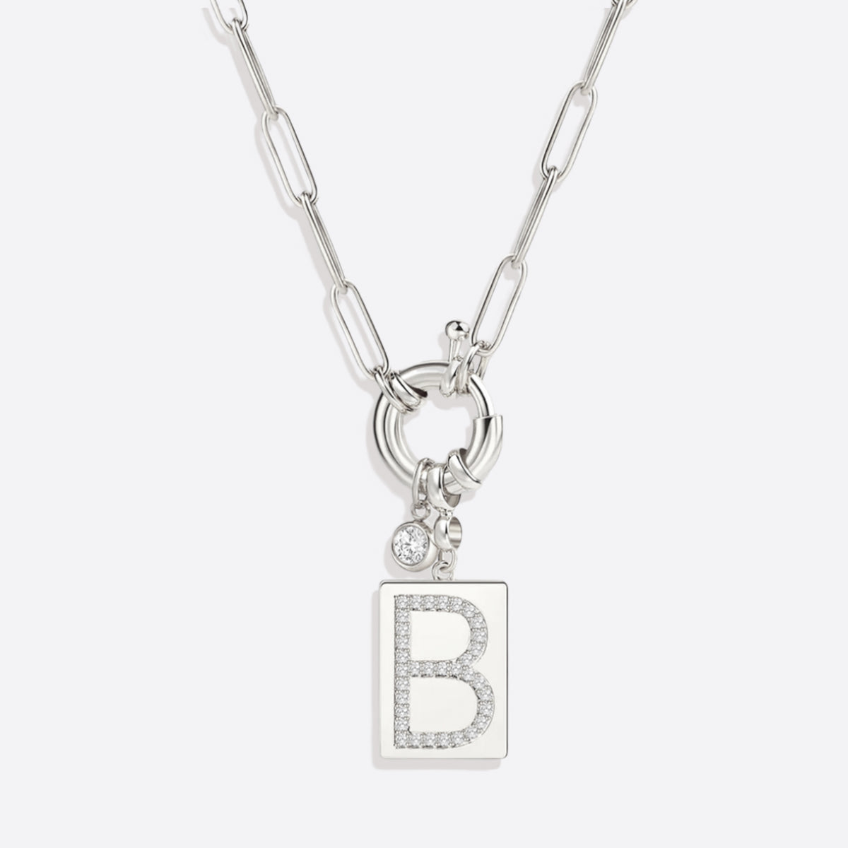 Collar con colgante de inicial pavé y cadena con clip