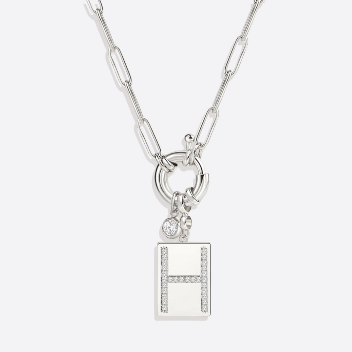 Collar con colgante de inicial pavé y cadena con clip