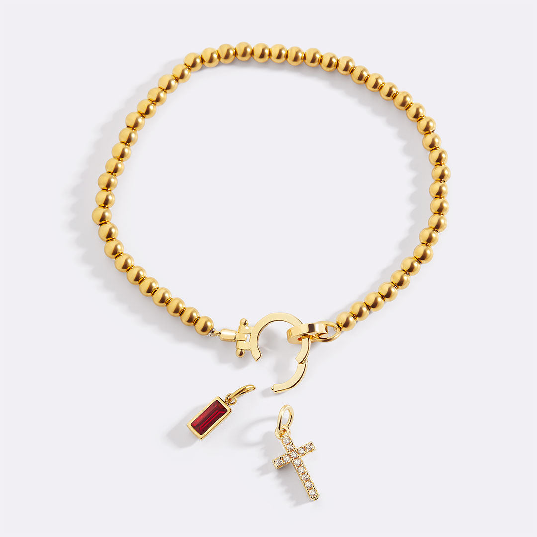Pendentif croix pavée