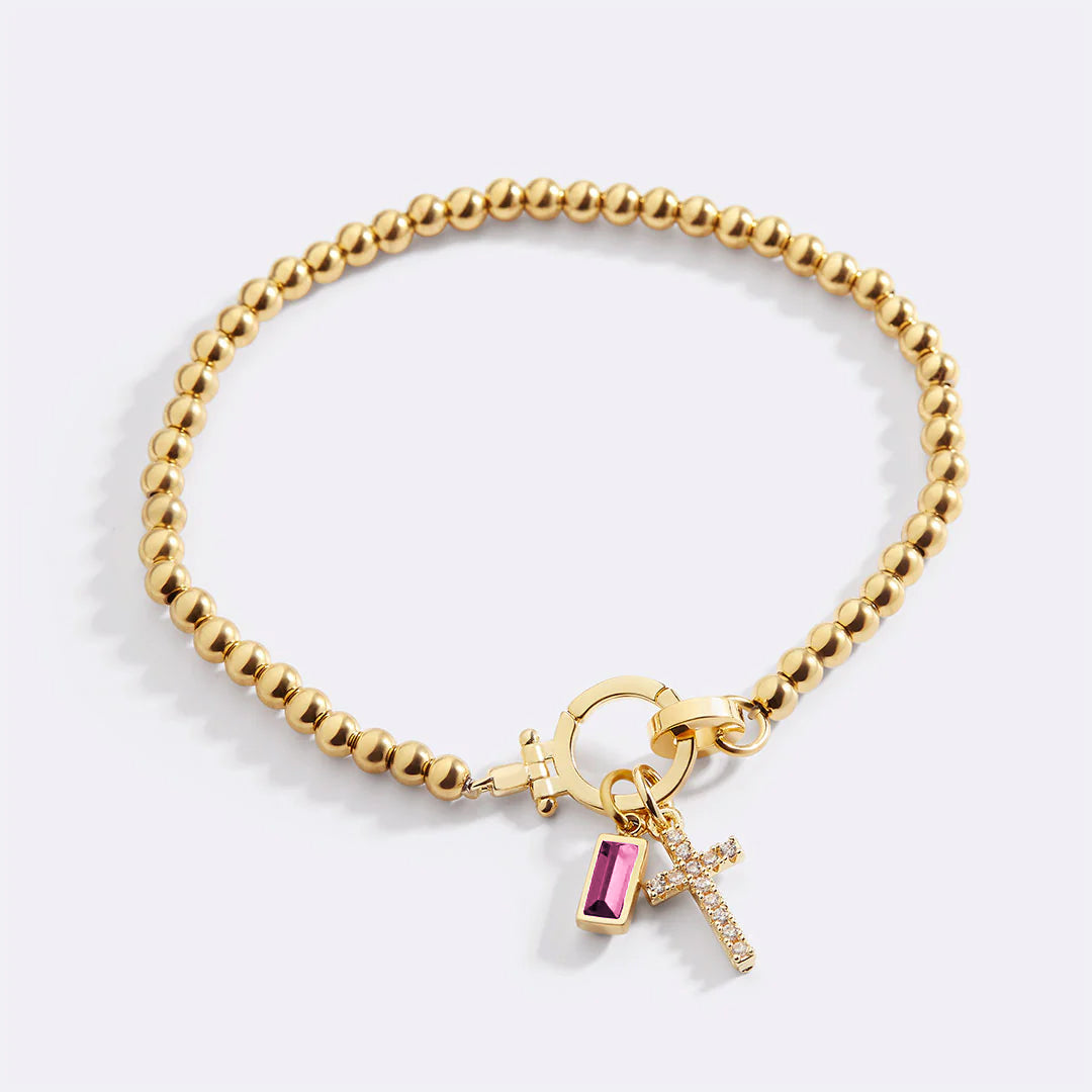 Pulsera con charm de cruz y piedra de nacimiento